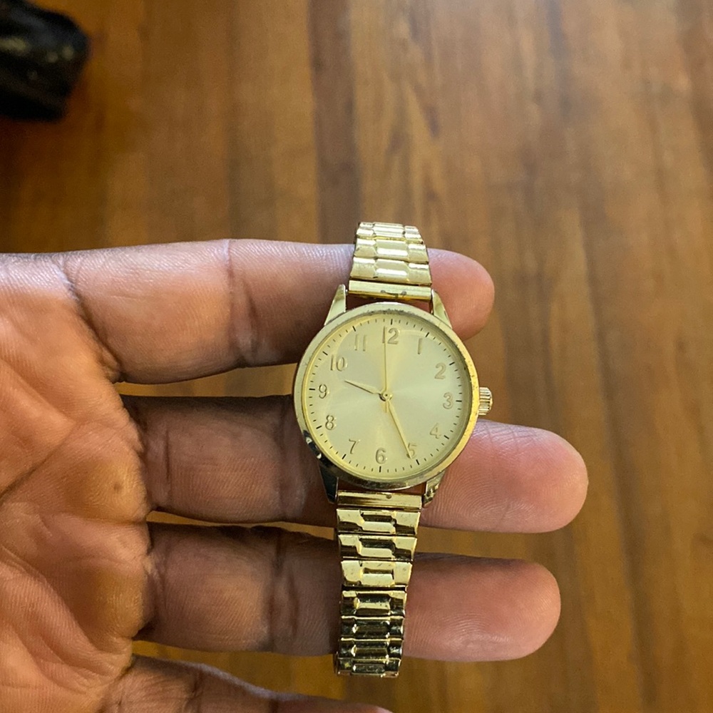 Bezel gold stainless steel watch